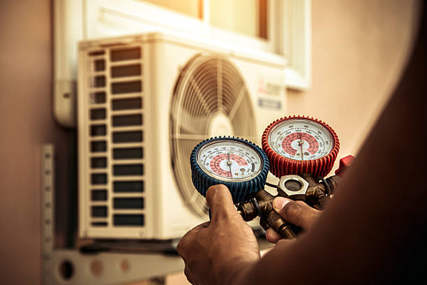 Professional Ac Installation technician working in Spanish Fort, AL